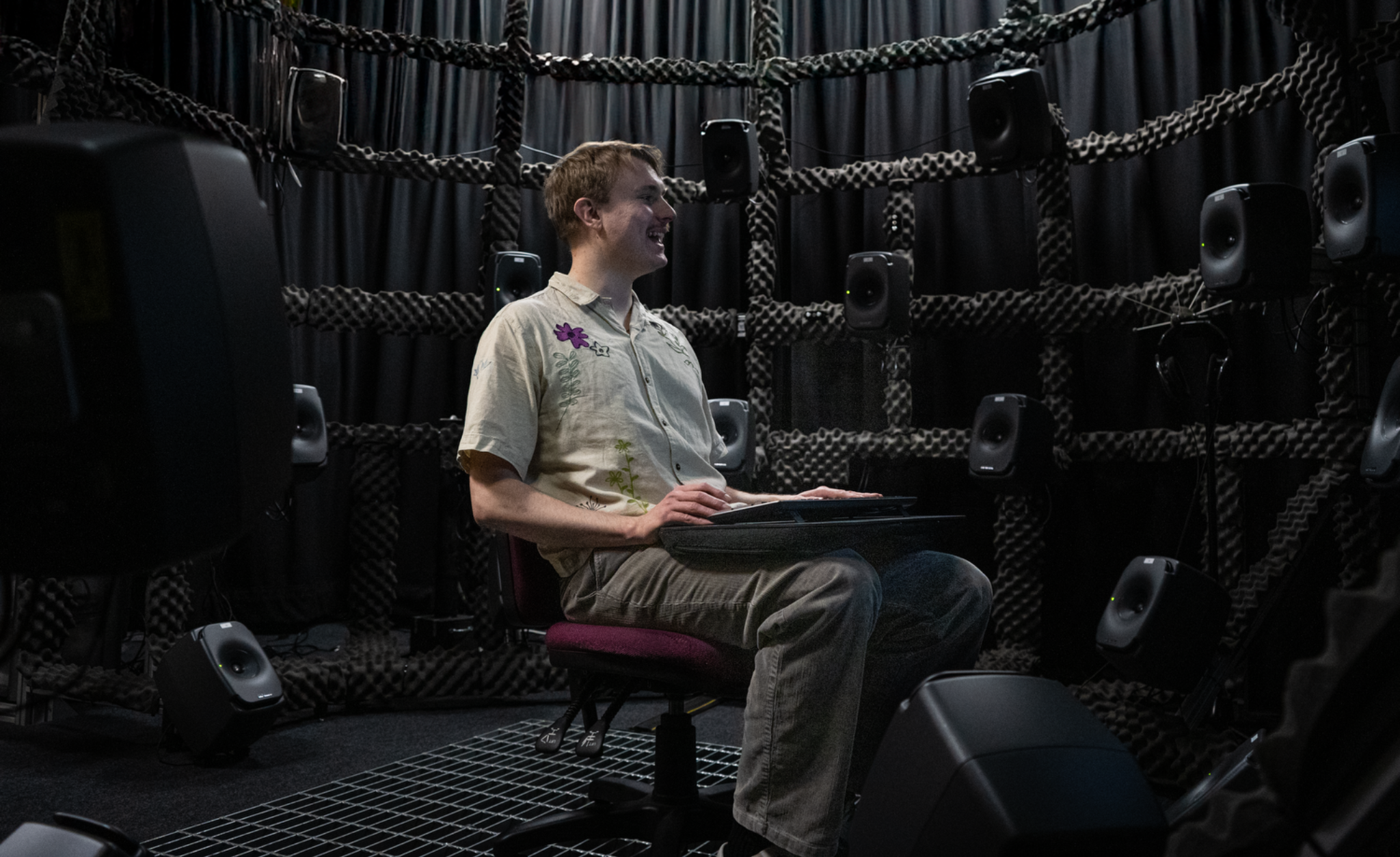 An artist working in a spatial audio studio
